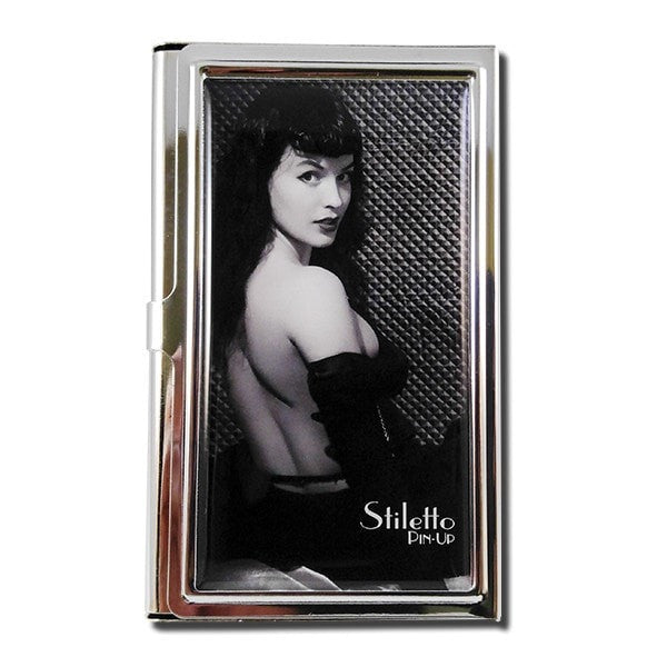 Femme' Fatale' - This dark angel with her shy yet flirtatious smile beckons you to discover her "Halo with Horns" attitude